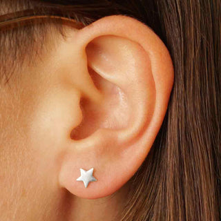 Sterling Silver Star Earring on Ear