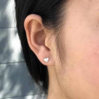 Sterling Silver Love Heart Post Earrings on Ear