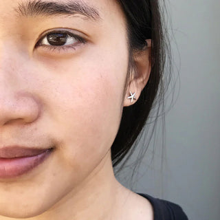 Sterling Silver Starfish Earrings on Ear