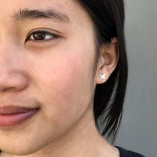 Sterling Silver Simple Butterfly Earrings on Ear