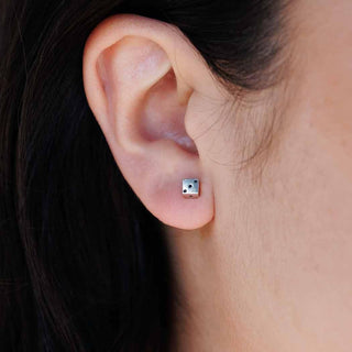 Sterling Silver Six Sided Dice Earring on Ear