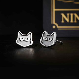 Sterling Silver Black Cat Face Post Earrings on black background