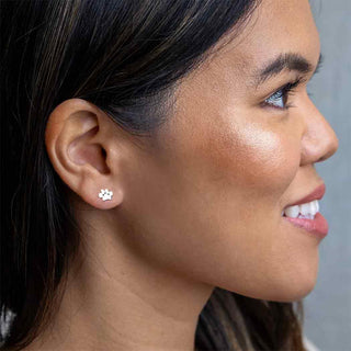 Sterling Silver Paw Print Earrings on Ear