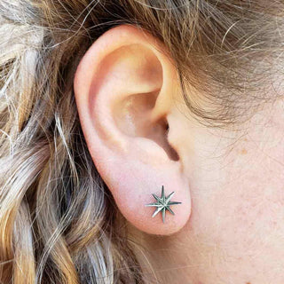 Sterling Silver Star Burst Earrings on Ear