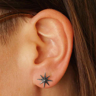 Sterling Silver Ridged Star Burst Earring on Ear