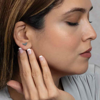 Sterling Silver Mini Bat Earrings on Ear