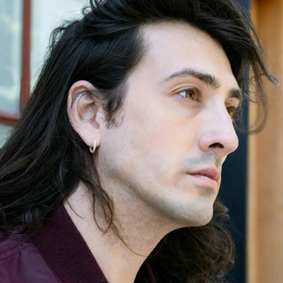 Sterling Silver Huggie Hoop Earring on Man model