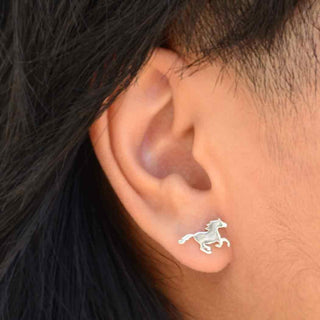 Sterling Silver Horse Earrings on Ear
