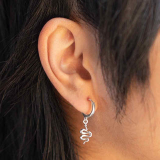 On ear photo of Sterling Silver Huggie Hoop with Snake Dangle