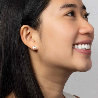Sterling Silver Puppy Earrings on Woman