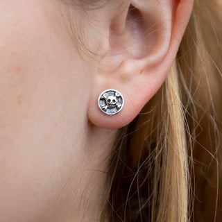 Sterling Silver Skull and Bones Earrings on Ear