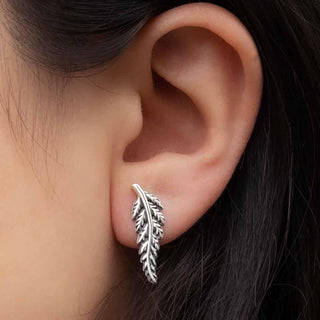 Sterling Silver Fern Post Earrings on ear