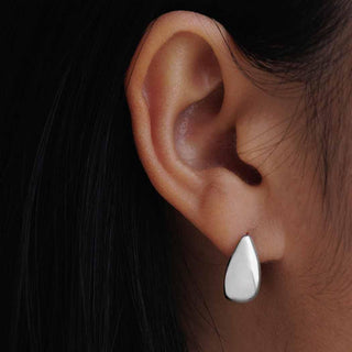 Sterling Silver Chunky Teardrop Huggie Earring on Ear