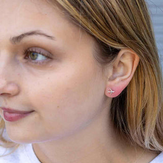 Sterling Silver Airplane Earrings on Ear