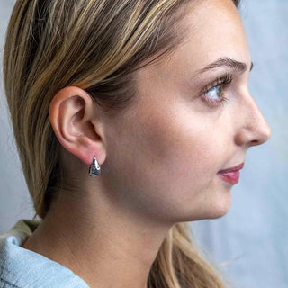 Sterling Silver Hammered Teardrop Huggie Earring on Ear