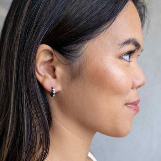 Sterling Silver Diamond Cut Huggie Hoop Earrings on Ear