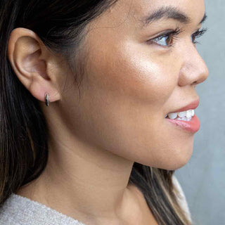 Sterling Silver Ridged Huggie Hoop Earrings on Ear
