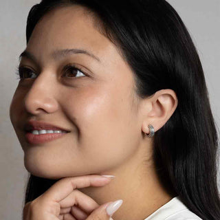 Sterling Silver Rdiged Macaroni Huggie Hoop on Ear