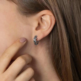 Sterling Silver Blossom Huggie Hoops on Ear