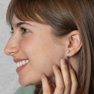 Sterling Silver Mini Antler Earring on Ear