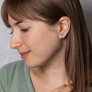 Sterling Silver Deer Skull with Antler Earring on Woman