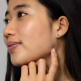 Sterling Silver Fishbone Post Earrings on female model
