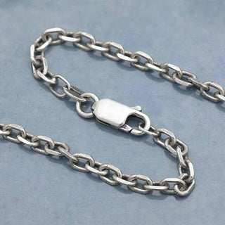Heavy Faceted Oval Chain on blue background