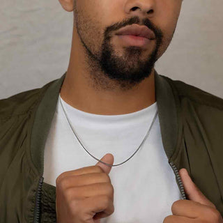 Sterling Silver Curb Chain Necklace on male model wearing green jacket and white shirt