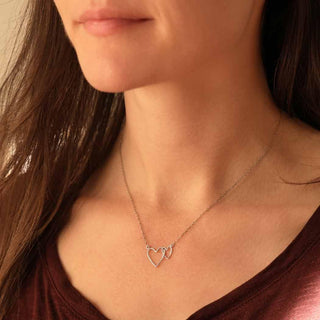 Sterling Silver Linked Hearts Necklace on Neck