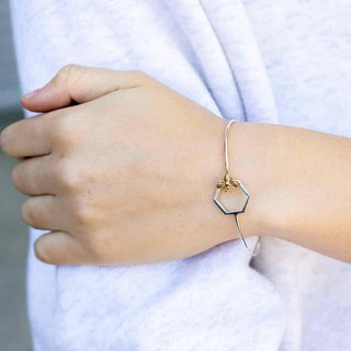 Dainty Silver Honeycomb Bracelet with Bronze Bee on Wrist