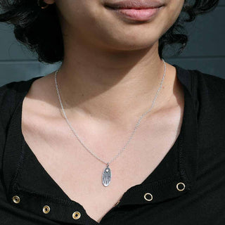Sterling Silver and Bronze North Star Forest Necklace on Neck