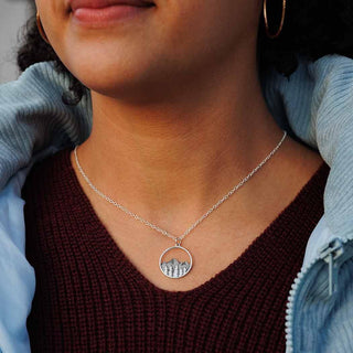 Sterling Silver Mountain and Trees Necklace on Woman