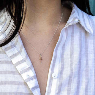 Mini Mixed Metal Silver and Bronze Sword Necklace on Woman