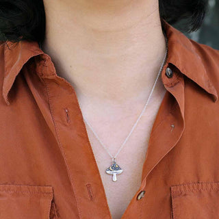 Sterling Silver Mushroom Necklace with Bronze Star and Moon on model