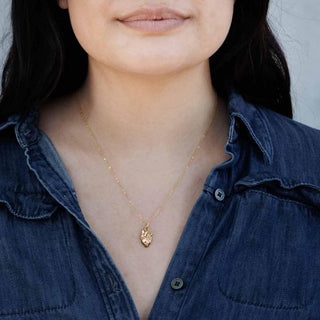 Bronze Anatomical Heart Necklace on Neck