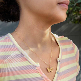 Bronze Butterfly Necklace on Woman