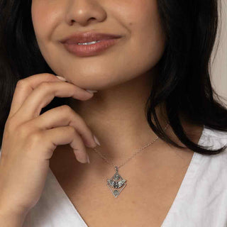 Sterling Silver Sun and Moon Moth Necklace on Woman