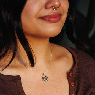 Sterling Silver Mushroom and Snail Necklace on model