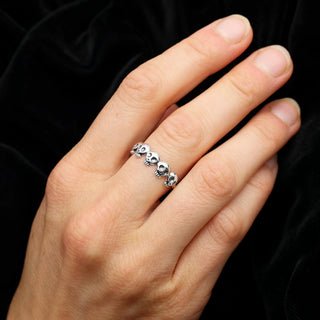 Sterling Silver Five Skull Ring on Finger