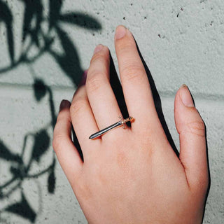 Sterling Silver and Bronze Horizontal Sword Ring on Hand