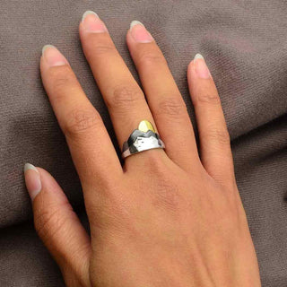 Sterling Silver Layered Mountain Ring with Bronze Sun on hand