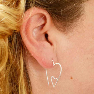 Sterling Silver Heart Shaped Wire Hoop Earrings on model