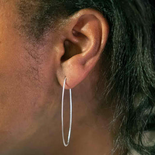Sterling Silver Large Oval Hoop Earrings on Ear