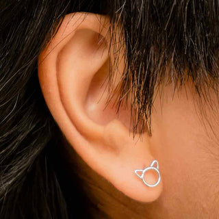 Sterling Silver Cat Head Outline Earrings on Ear