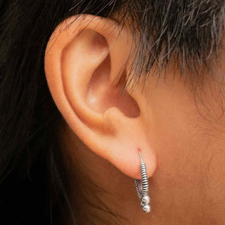 Sterling Silver Coiled Wire Hoop Earrings on Ear