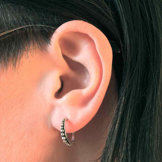Sterling Silver Hoop Earrings with Balinese Granulation on Ear