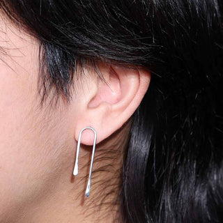 Sterling Silver Asymmetrical Arch Earrings on Ear