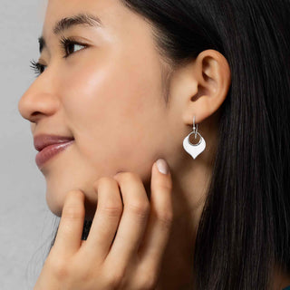 Sterling Silver Lotus Petal Dangle Earrings on model