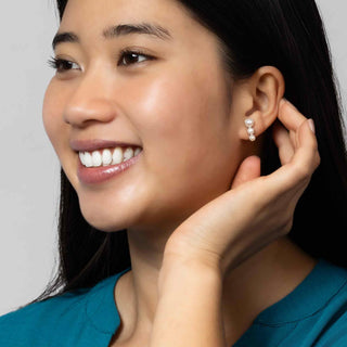 Sterling Silver Three Pearl Earrings on Ear