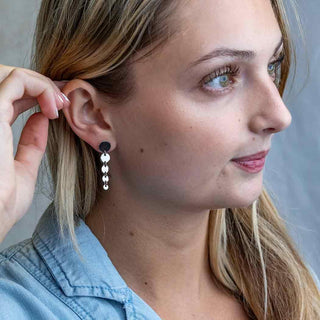 Sterling Silver Cascading Circle Earrings on Ear